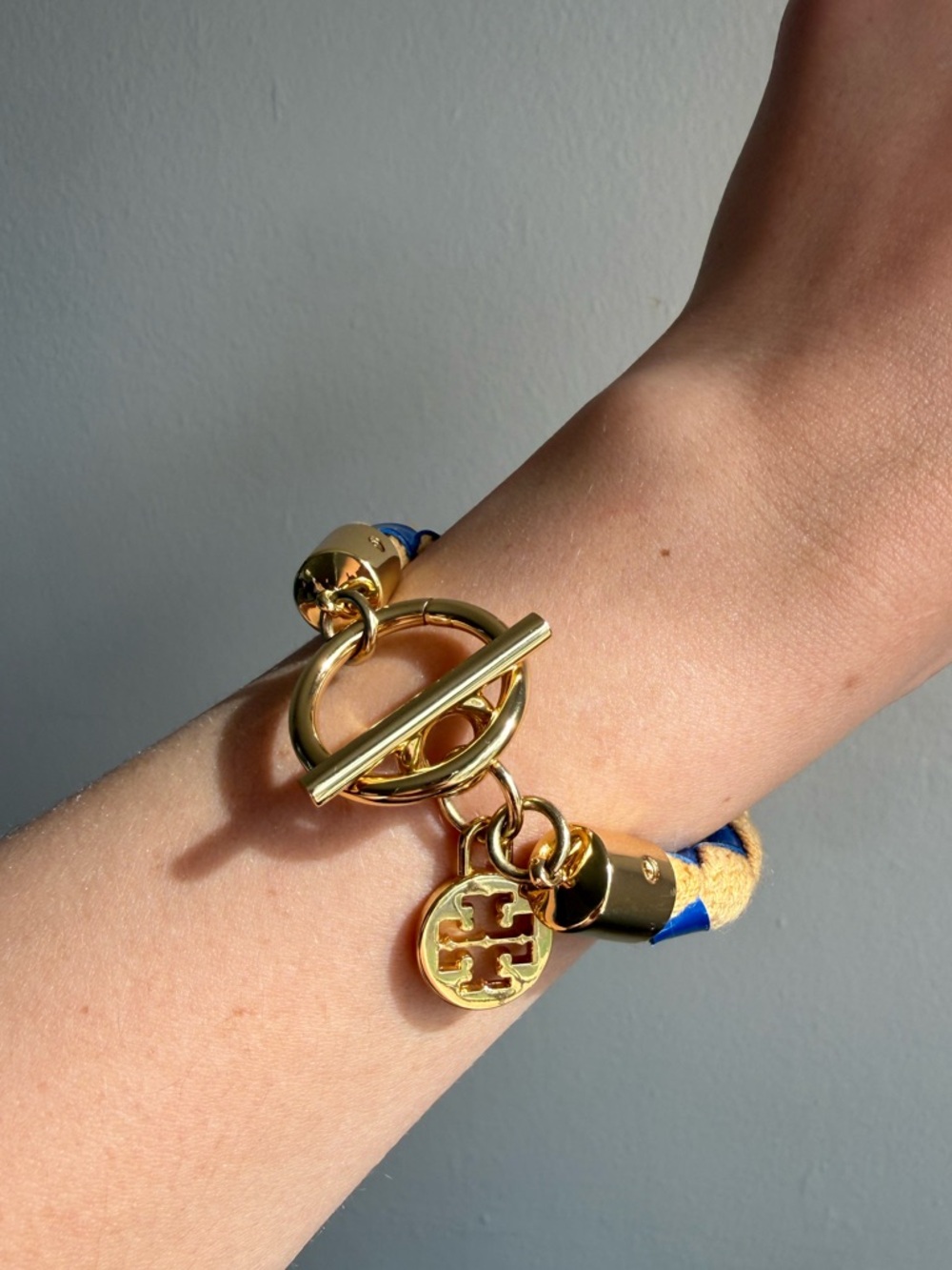 Tory Burch Gold and Blue Toggle Charm Bracelet